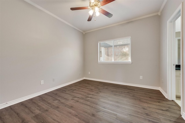 spare room with crown molding, ceiling fan, and dark hardwood / wood-style floors