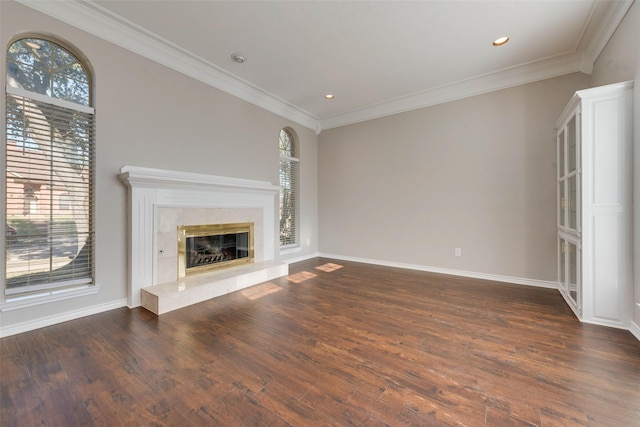 unfurnished living room featuring dark hardwood / wood-style flooring and a healthy amount of sunlight