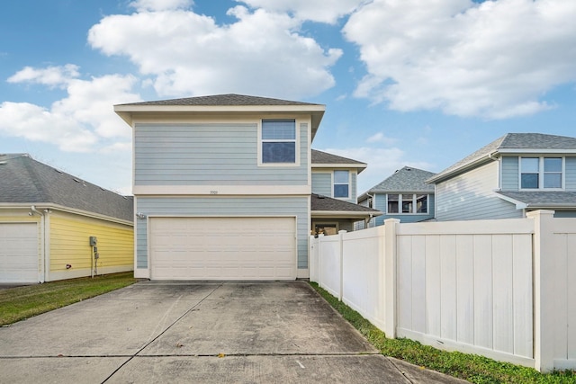 view of front of property with a garage