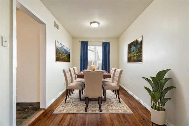 4855 Haas Dr, Dallas, TX 75216 - dining space with wood finished floors and baseboards