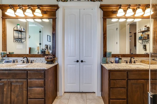 bathroom featuring vanity and tile patterned flooring