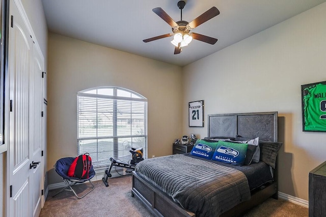 carpeted bedroom featuring ceiling fan