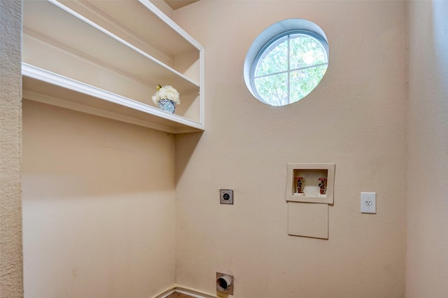 clothes washing area with electric dryer hookup and hookup for a washing machine