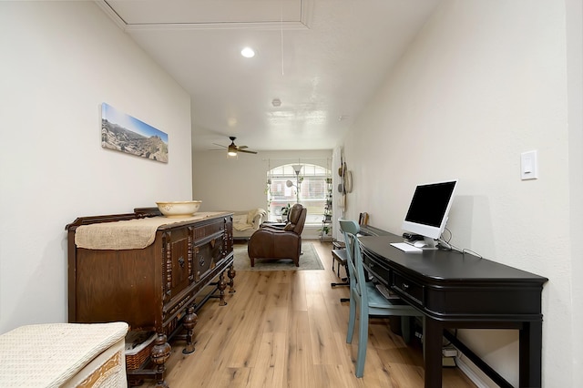 office space featuring ceiling fan and light hardwood / wood-style flooring