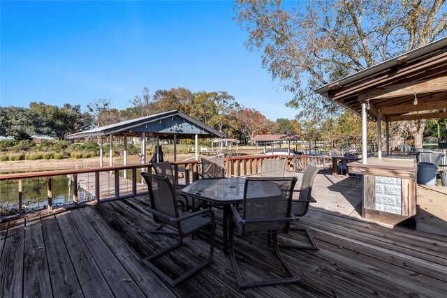 deck featuring a water view