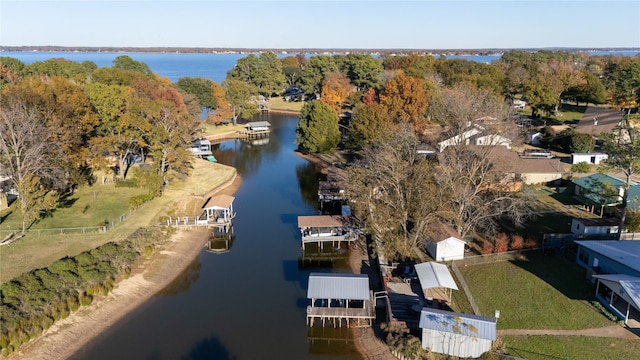 drone / aerial view with a water view