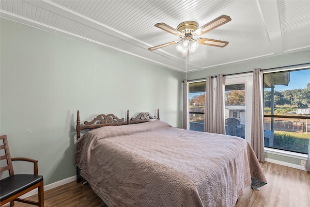 bedroom with ceiling fan and wood-type flooring