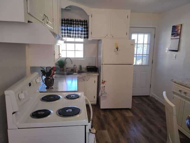 kitchen featuring white cabinets, plenty of natural light, white appliances, and sink