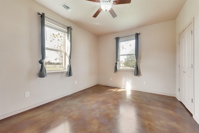 unfurnished bedroom featuring ceiling fan