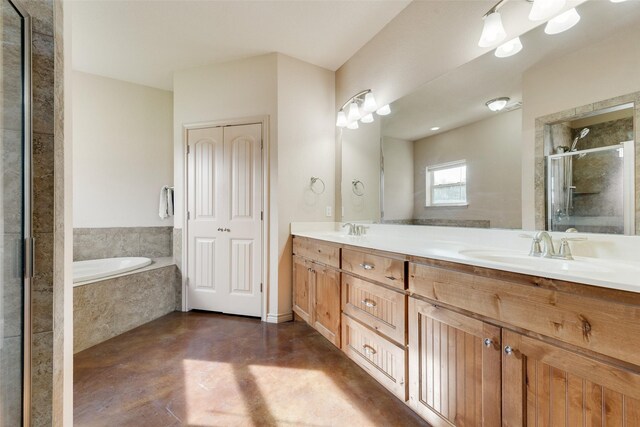 bathroom with vanity, separate shower and tub, and concrete floors