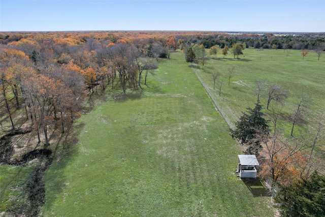 birds eye view of property featuring a rural view