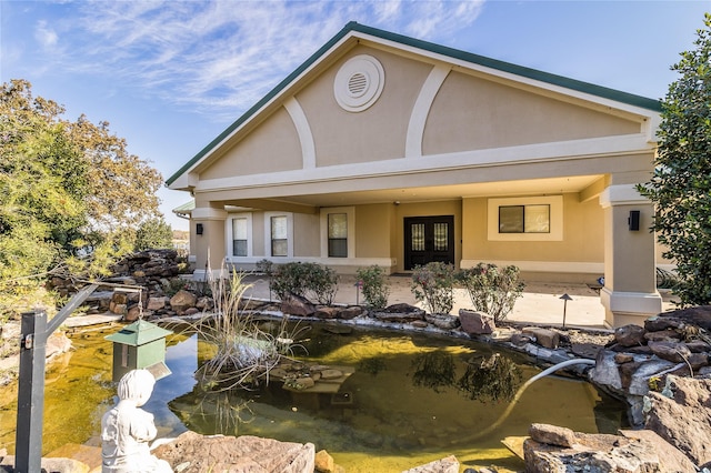 view of front of property featuring french doors