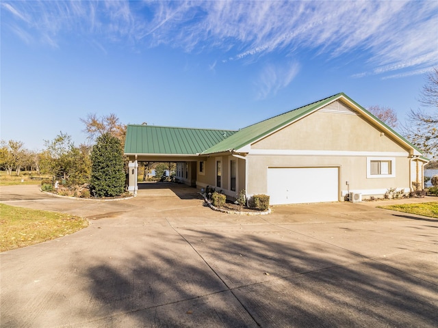 view of side of property with a carport