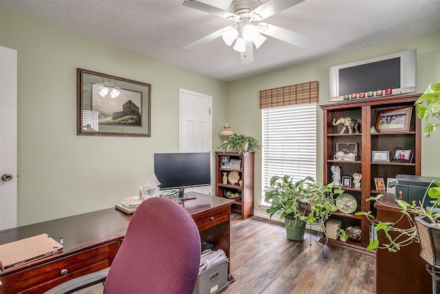 office area featuring ceiling fan, a textured ceiling, and hardwood / wood-style flooring