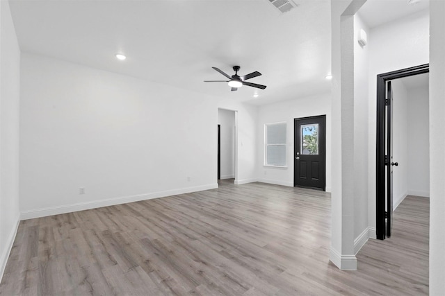 entrance foyer featuring ceiling fan and light wood-type flooring