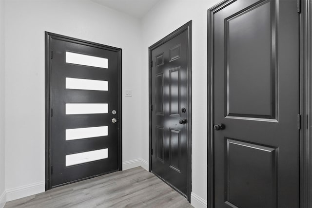 entrance foyer featuring light hardwood / wood-style flooring