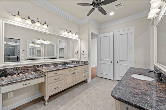 bathroom with tile patterned flooring, vanity, ceiling fan, and ornamental molding