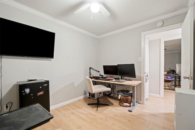 office area with light hardwood / wood-style floors, ceiling fan, and ornamental molding