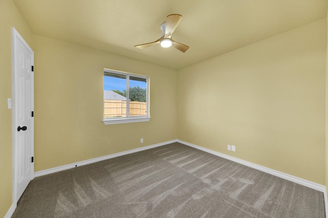 carpeted empty room with ceiling fan