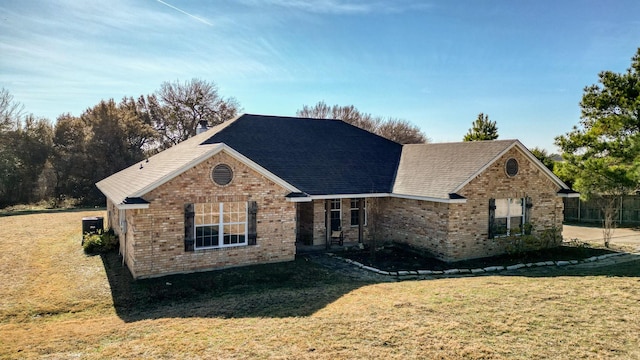 view of front of home with a front lawn