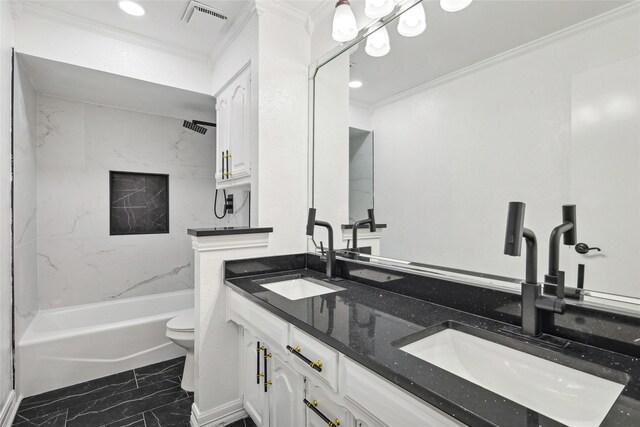 full bathroom featuring tiled shower / bath combo, toilet, crown molding, and vanity