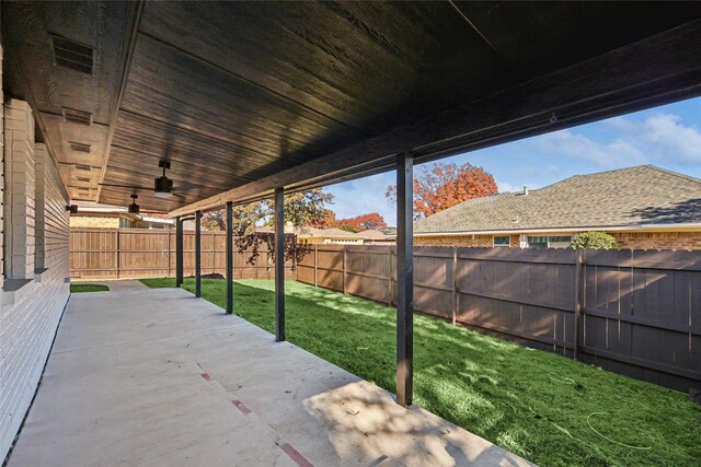 view of patio featuring ceiling fan