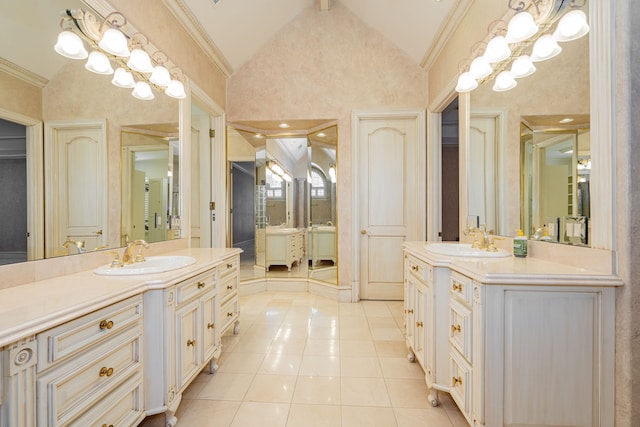 bathroom featuring tile patterned floors, vanity, and high vaulted ceiling