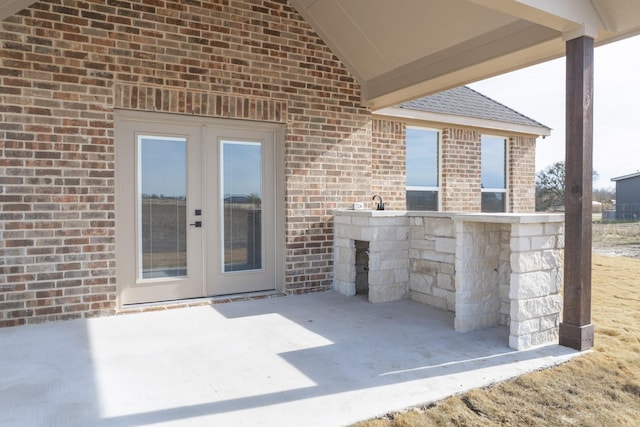 view of patio featuring french doors