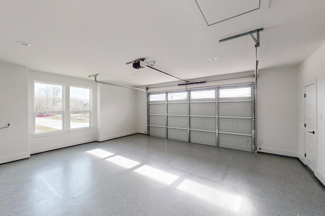 garage featuring a garage door opener