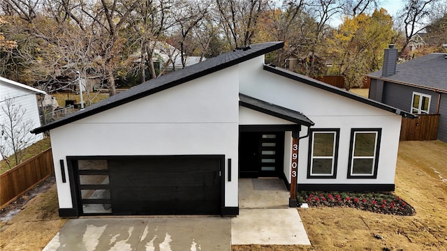 contemporary house featuring a garage