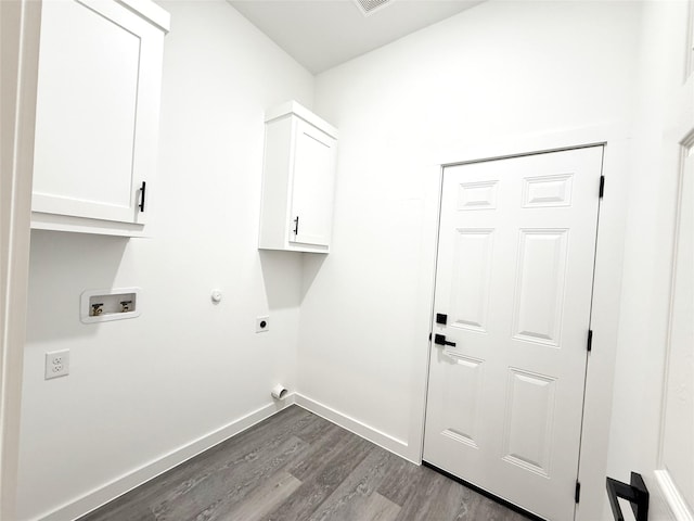 laundry area with cabinets, hardwood / wood-style floors, electric dryer hookup, and washer hookup