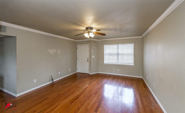 living room with ornamental molding, ceiling fan, and dark wood-type flooring