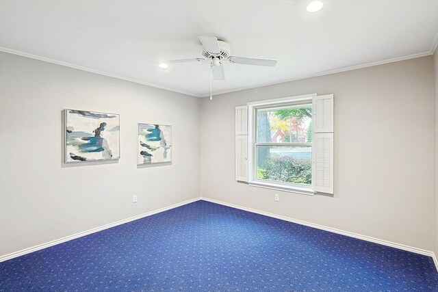 carpeted spare room with crown molding and ceiling fan