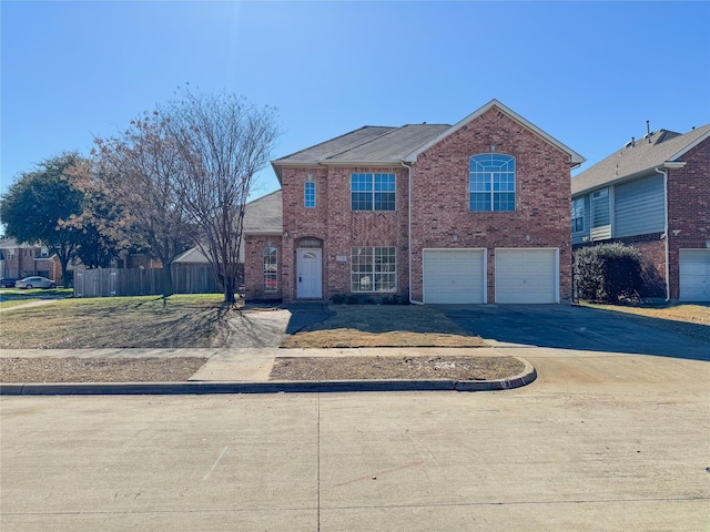 front of property with a garage