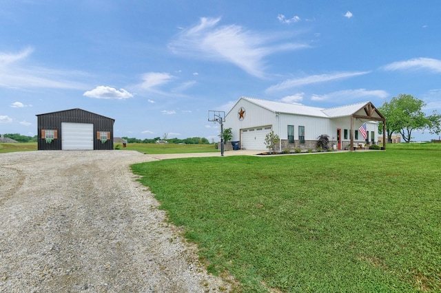 exterior space featuring a garage and a front lawn