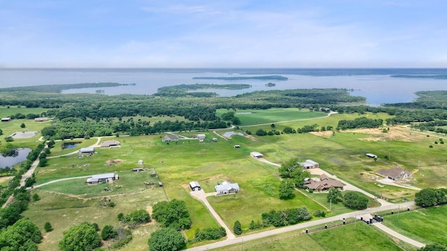 aerial view with a rural view and a water view