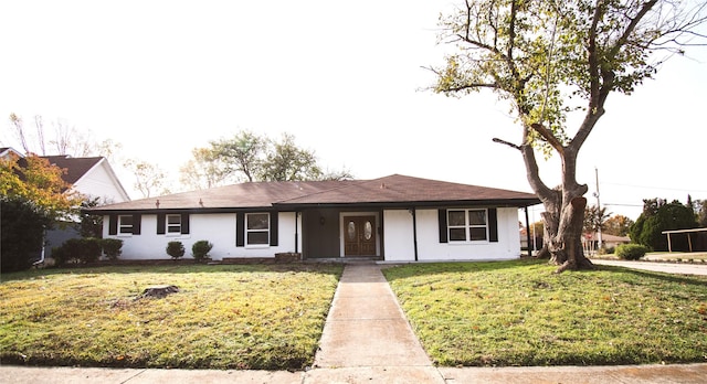 single story home with a front lawn