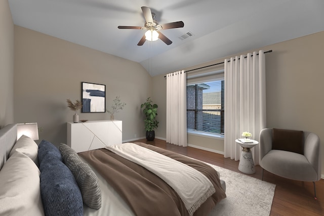 bedroom featuring ceiling fan, vaulted ceiling, and hardwood / wood-style flooring