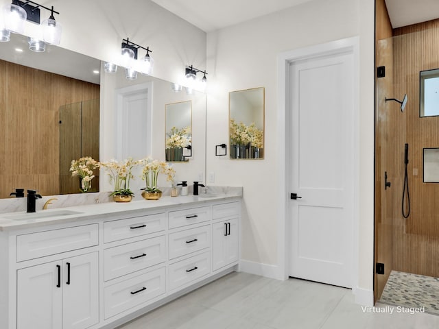 bathroom with tile patterned flooring, vanity, and a shower with shower door