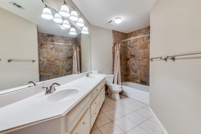 full bathroom with vanity, tile patterned floors, shower / bath combination with curtain, and toilet