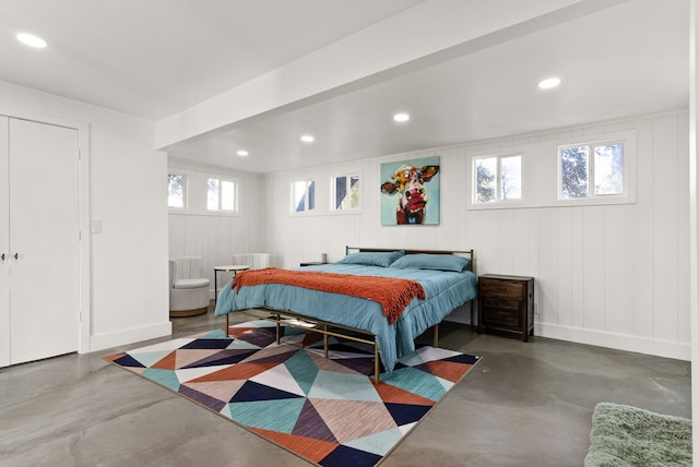 bedroom with concrete floors