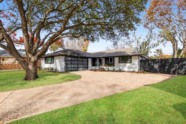 ranch-style house with a front yard