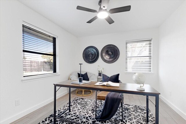 office area featuring hardwood / wood-style floors and ceiling fan