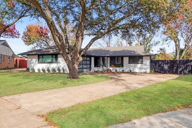 ranch-style house with a front yard