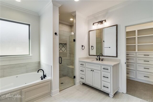 bathroom featuring vanity, crown molding, and plus walk in shower