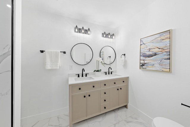 bathroom with vanity and toilet