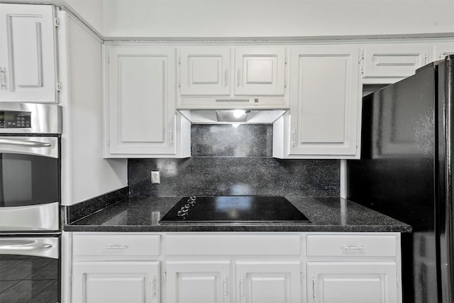 kitchen featuring white cabinets, backsplash, and black appliances