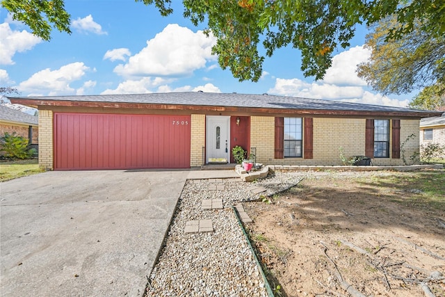 single story home with a garage