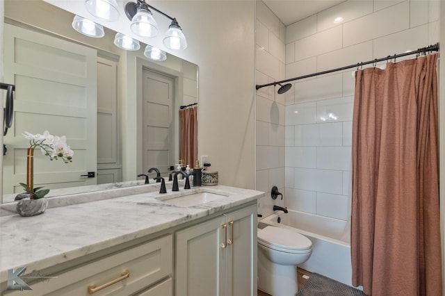 full bathroom with vanity, toilet, and shower / tub combo