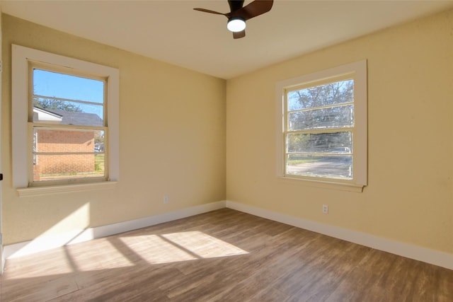 unfurnished bedroom featuring ceiling fan and hardwood / wood-style floors